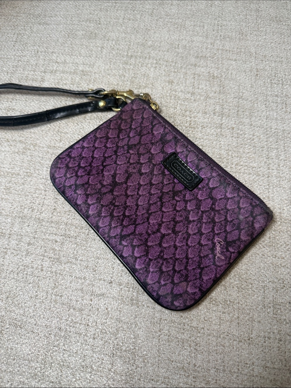 Coach Purple Snake-Print Wristlet with Black Strap